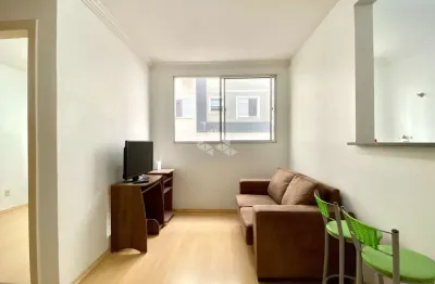 Apartamento semi mobiliado a venda 2 dormitórios, 1 suíte, 1 banheiro, sala, cozinha, área de serviço, box fixo
