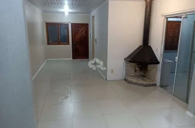 Casa a venda em condomínio com 2 dormitórios, sala , cozinha, banheiro, garagem