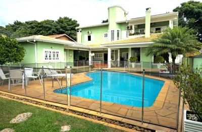 Casa em condomínio shamballa com adega, piscina e espaço gourmet, tudo num terreno de 800m²!!
