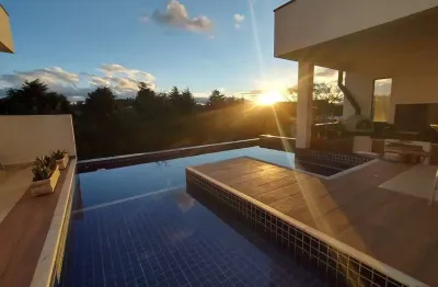 Venha se encantar com essa linda casa térrea, com um projeto apaixonante, com espaços integrados e dentro do condomínio serra da estrela em atibaia sp