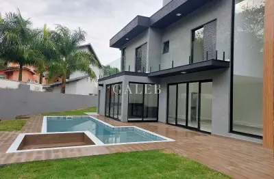 Sobrado à venda com 4 suítes, 306m² construído, condomínio de alto padrão, condomínio clube