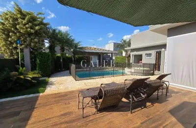 Incrível casa térrea moderna em condomínio com área de lazer completa, academia e campo de futebol em atibaia-sp.