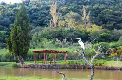 Terreno à venda com 1.255,86m² em condomínio,  dentro da cidade