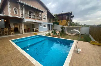 Um charme de casa no Condomínio Palavra da Vida: 05 Quartos, 04 Suítes, sala com lareira, área gourmet completa e uma vida de tranquilidade!