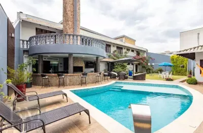 Casa com 6 dormitórios/3 suítes, 4 vagas à venda, 560 m² por r$ 2.800.000 - agua verde - curitiba/pr