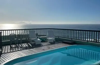 Lindo apartamento na praia dos Cavaleiros de frente para o mar