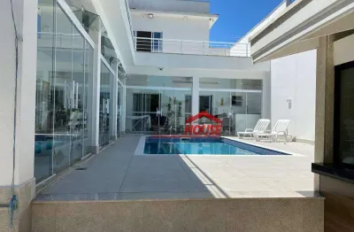 Casa com 4 dormitórios à venda, 393 m² por r$ 1.700.000 - centro - caraguatatuba/sp