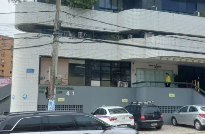 Vendo loja em centro comercial no rio vermelho de 320 mil por 260 mil