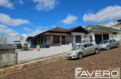 Venda de lote com casa de madeira – centro de pato branco - ven258