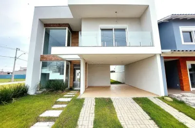 Casa em condomínio fechado com 3 quartos à venda na avenida frederico warstat, 695, sans souci, eldorado do sul por r$ 750.000