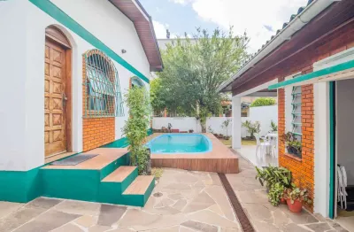 Casa em condomínio fechado com 3 quartos à venda na rua congo, 110, vila ipiranga, porto alegre por r$ 1.100.000