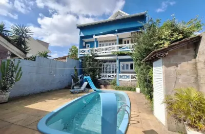 Casa em condomínio fechado com 3 quartos à venda na rua itapema, 156, vila jardim, porto alegre por r$ 1.005.000