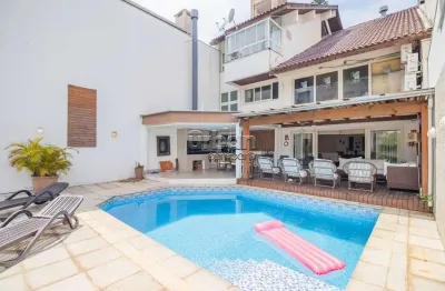 Casa em condomínio fechado com 4 quartos à venda na afonso césar, 62, boa vista, porto alegre por r$ 4.300.000
