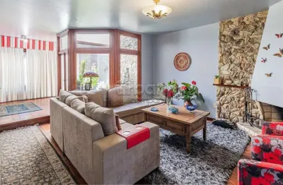 Casa em condomínio fechado com 4 quartos à venda na avenida joão wallig, 2125, chácara das pedras, porto alegre por r$ 2.230.000