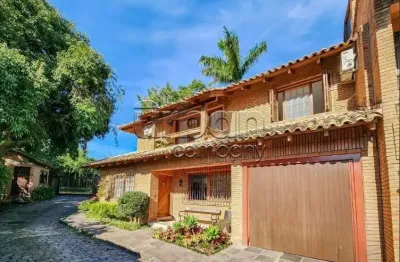Casa em condomínio fechado com 3 quartos à venda na rua carlos júlio becker, 295, tristeza, porto alegre por r$ 860.000
