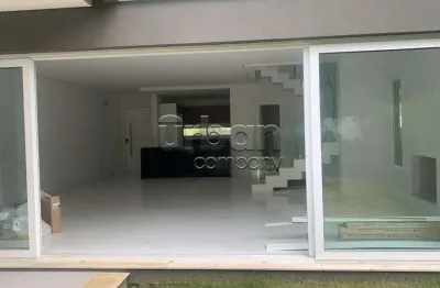 Casa em condomínio fechado com 3 quartos à venda na rua doutor ney de castilhos ferreira, 300, pedra redonda, porto alegre por r$ 2.870.000