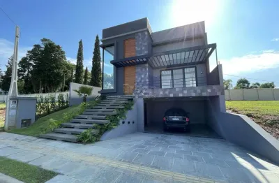 Casa em condomínio fechado com 4 quartos à venda na rua adolfo inácio de barcelos, 1490, centro, gravataí por r$ 1.950.000