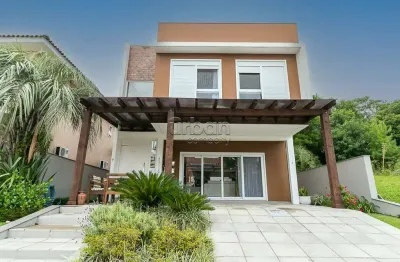 Casa em condomínio fechado com 4 quartos à venda na avenida senador salgado filho, 8500, condomínio buena vista, viamão por r$ 2.200.000