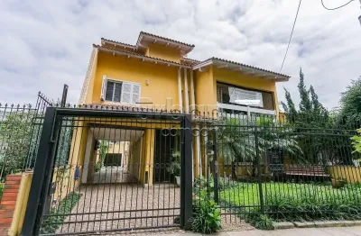 Casa com 5 quartos à venda na travessa gardênia, 110, são sebastião, porto alegre por r$ 1.180.000