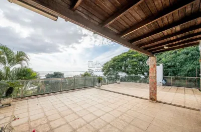 Casa em condomínio fechado com 4 quartos à venda na avenida pinheiro borda, 148, cristal, porto alegre por r$ 1.150.000