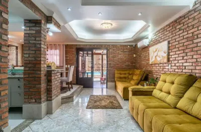 Casa em condomínio fechado com 3 quartos à venda na rua ramis galvão, 223, passo da areia, porto alegre por r$ 1.478.000
