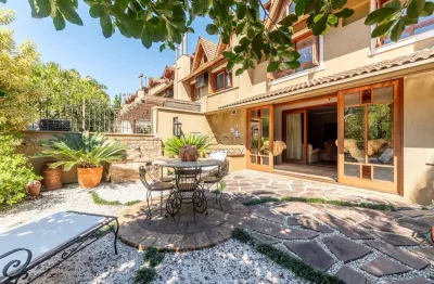 Casa em condomínio fechado com 3 quartos à venda na rua osório tuyuty de oliveira freitas, 120, três figueiras, porto alegre por r$ 3.200.000