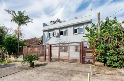 Casa em condomínio fechado com 4 quartos à venda na avenida josé gertum, 544, chácara das pedras, porto alegre por r$ 1.490.000