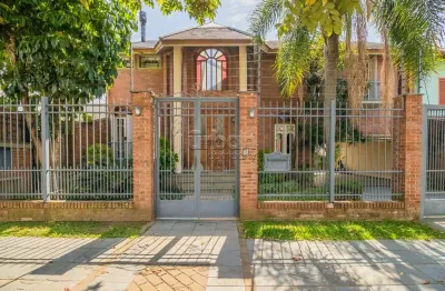 Casa em condomínio fechado com 3 quartos à venda na rua maestro salvador campanella, 395, jardim planalto, porto alegre por r$ 1.430.000