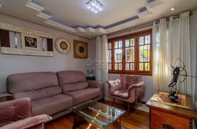 Casa em condomínio fechado com 4 quartos à venda na travessa porto príncipe, 59, jardim lindóia, porto alegre por r$ 1.650.000