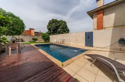 Casa em condomínio fechado com 4 quartos à venda na rua joão paetzel, 1032, chácara das pedras, porto alegre por r$ 2.500.000