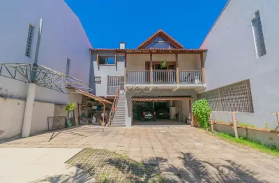 Casa em condomínio fechado com 4 quartos à venda na avenida josé gertum, 369, chácara das pedras, porto alegre por r$ 1.995.000