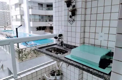 Apartamento frente ao mar com sacada gourmet e lazer completo