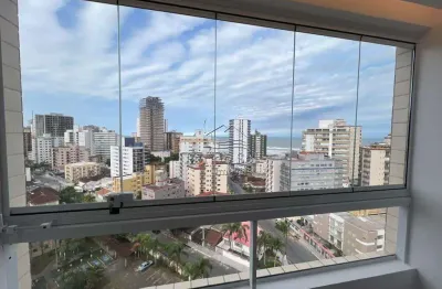 Apartamento com 2 dormitórios à venda, 60 m² por R$ 365.000 - Caiçara - Praia Grande/SP