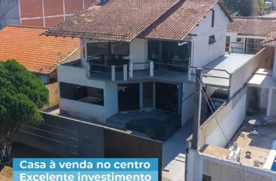 Casa ampla com terreno excelente no centro de guaratuba a poucas quadras da praia central