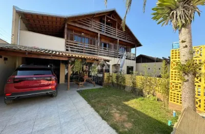 Casa com 6 quartos à venda na rua leopoldo olegário brenneisen, 398, centro, barra velha por r$ 1.000.000