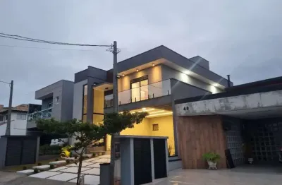 Casa de condomínio para venda possui 240 metros quadrados com 3 quartos