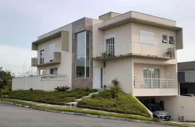 Casa de condomínio para venda com 290 metros quadrados com 3 quartos