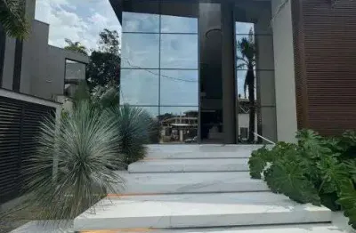 Casa a venda com 06 suites, 06 vagas cobertas e elevador em riviera de sao lourenco