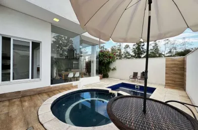 Casa alto padrão com 3 suítes e piscina no condomínio central parque em salto/sp