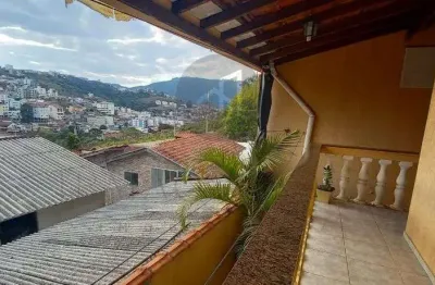 Linda casa bairro quisisana com area gourmet e terreno grande