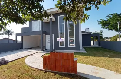Casa com 03 suítes no melhor e mais bem localizado condomínio da região