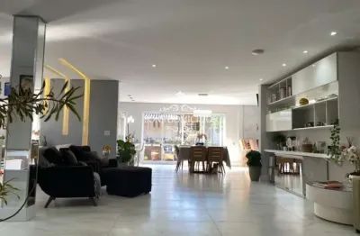 Casa linda estilo americana com conceito aberto e super requintada no condomínio nova higienópolis. a casa dos seus sonhos!