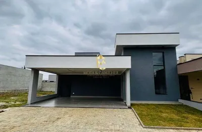 Linda casa térrea com 3 dormitórios e piscina em condomínio.