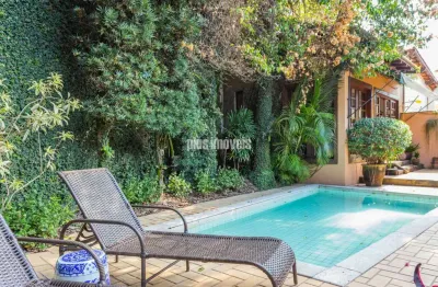 Linda casa jardim guedala 361,0m²ac - 620,0m²áre de terreno - 3 suítes  4 garagem  -  área de lazer