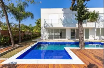 Casa em condomínio fechado 786,97 m² área privativa 4 suítes -8 gar - lazer  privativo com piscina