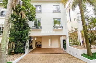 Casa em condomínio com 350,0m²ac - 3 suítes  3 garagem - áre gourmet