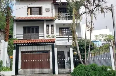 Casa com 4 quartos à venda na vila jardim, porto alegre  por r$ 800.000