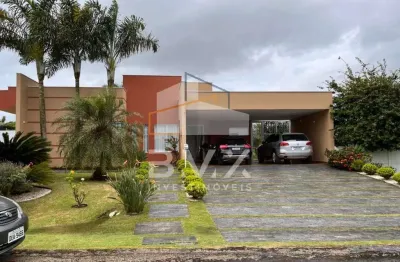 Luxuosa casa de 5 suítes no condomínio village ipanema 1 em araçoiaba da serra-sp: 400m², 2 salas, 7 banheiros e 16 vagas.
