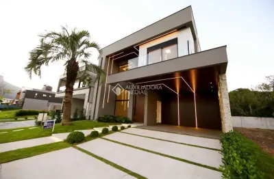 Casa em condomínio fechado com 3 quartos à venda na rua lagoinha, 65, pedra branca, palhoça, 298 m2 por r$ 3.690.000