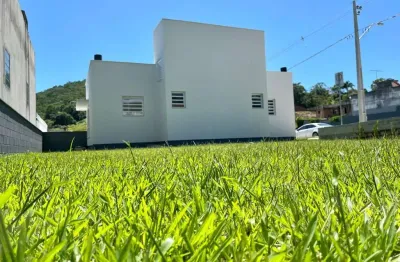 Terreno em condomínio fechado à venda na rua homero de miranda gomes, 1411, fundos, biguaçu, 150 m2 por r$ 152.000